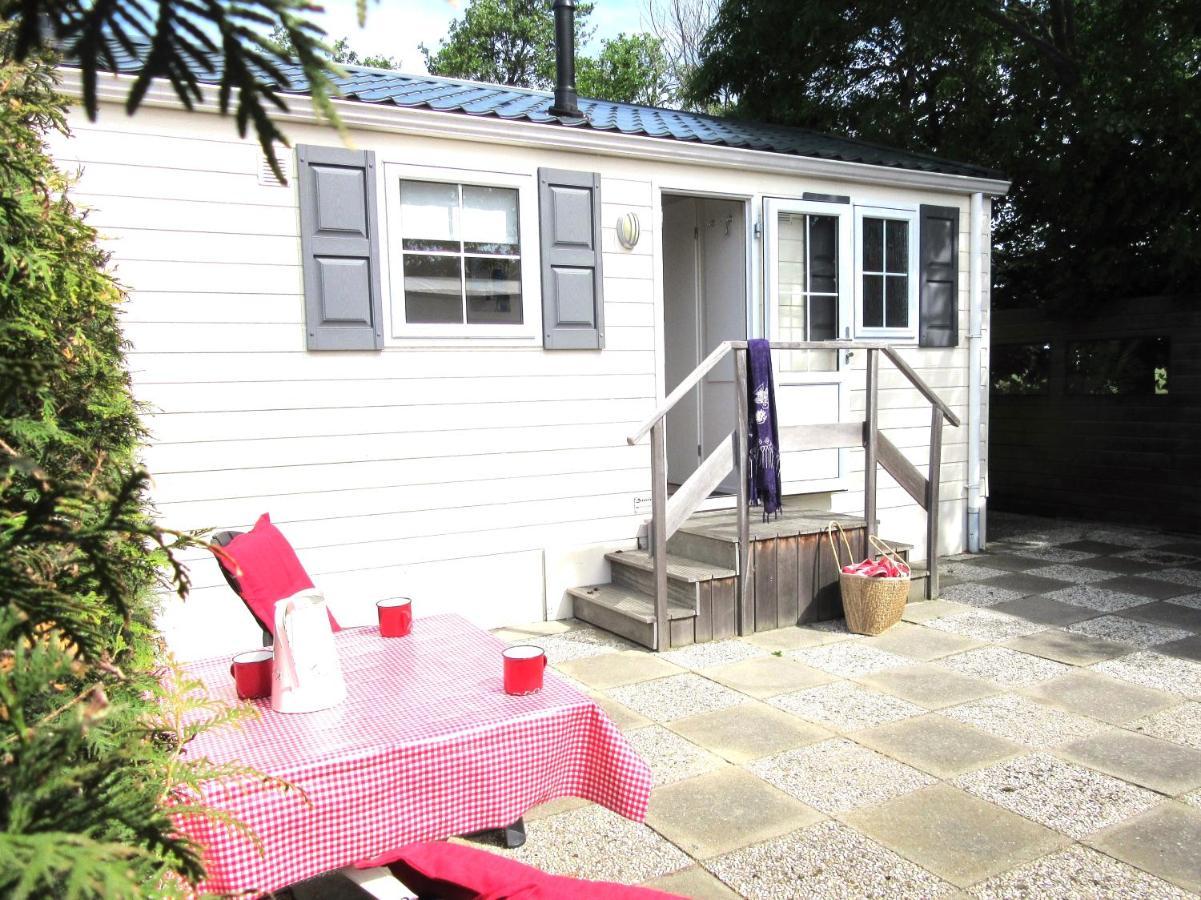 Chalet 556 op Recreatiepark De Wielen Sint Maarten Buitenkant foto